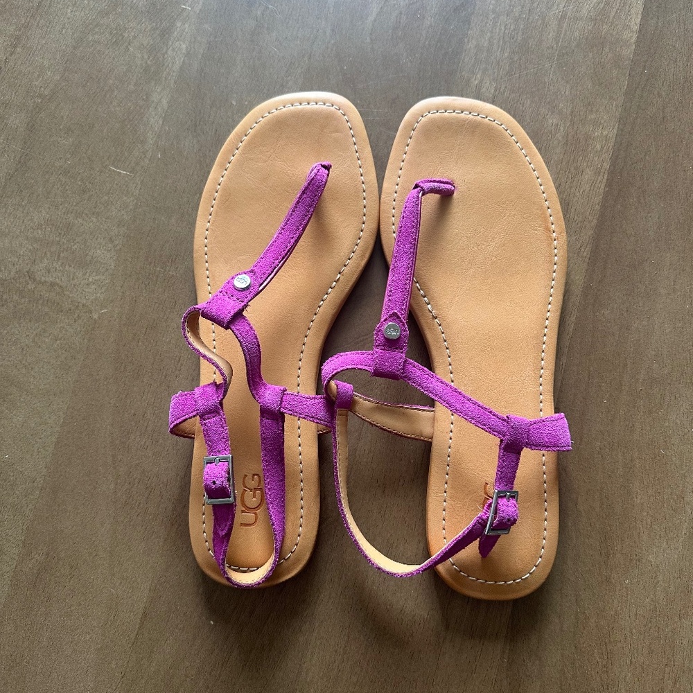 UGG sandals magenta purple straps and brown base.